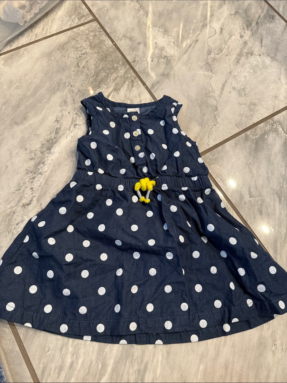 Girls' Navy Polka Dot Sleeveless Dress with Yellow Tie Accent